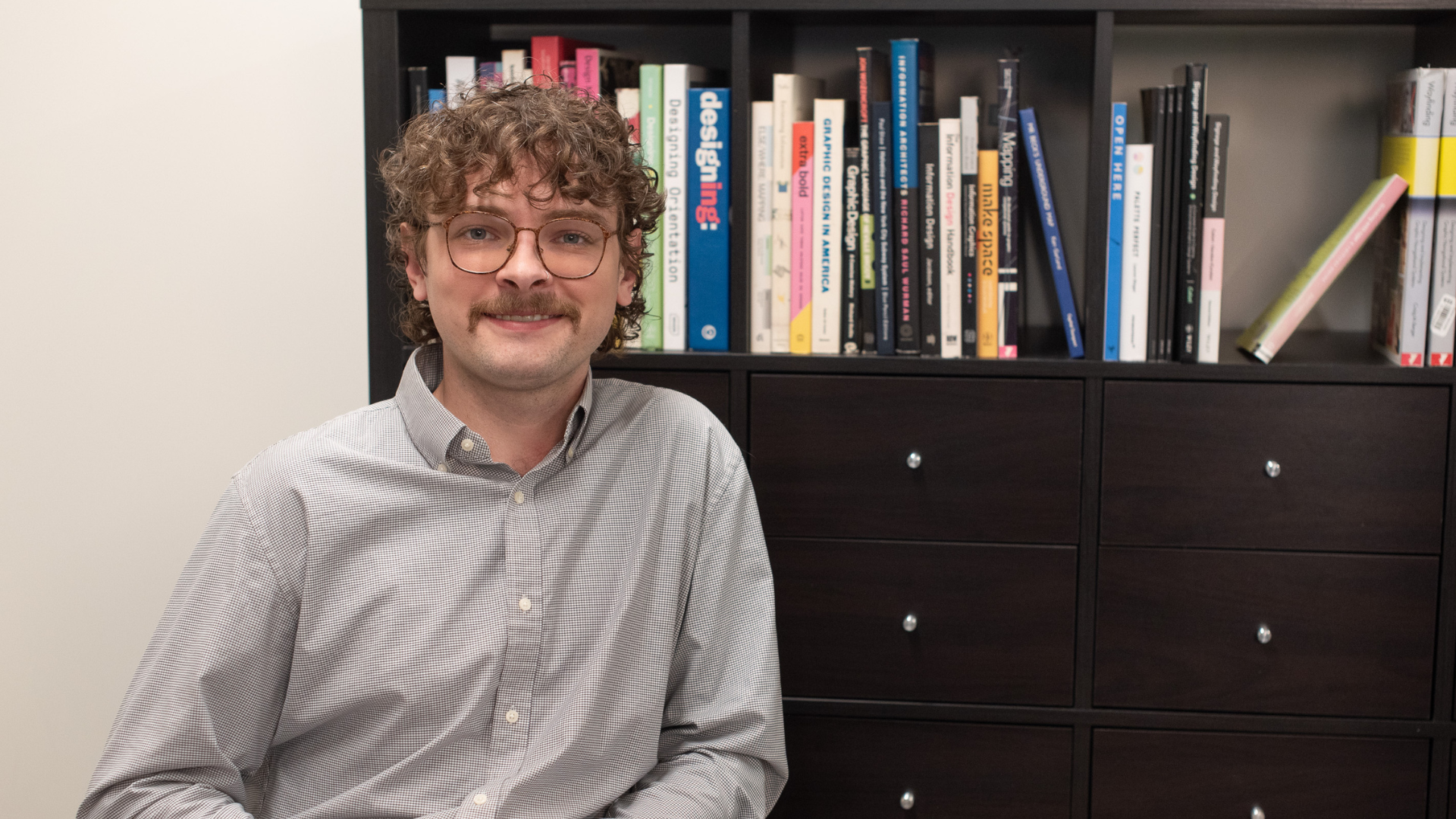Gus Whitaker Senior GraphicDesigner
